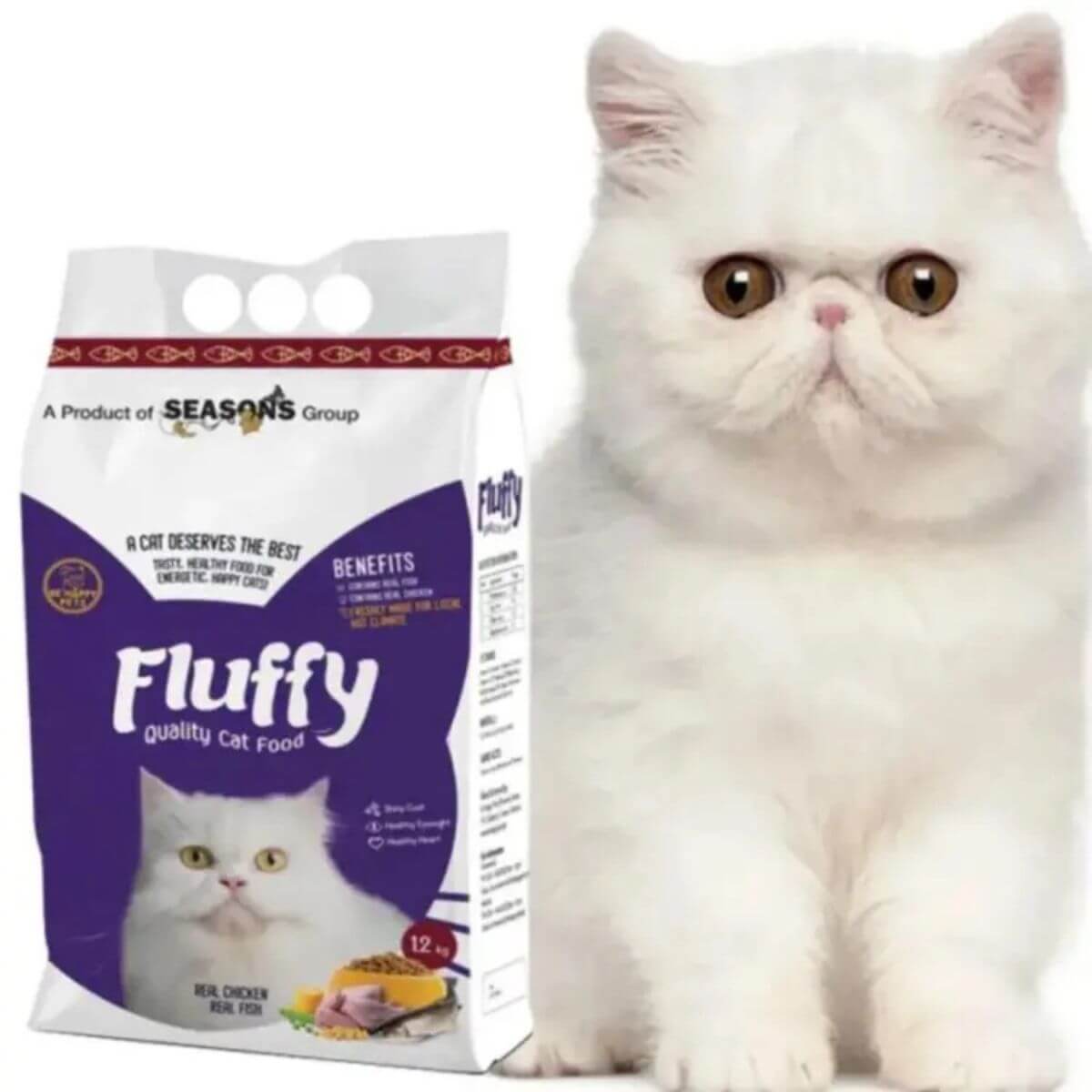 White cat sitting next to a package of Fluffy cat food on a white background
